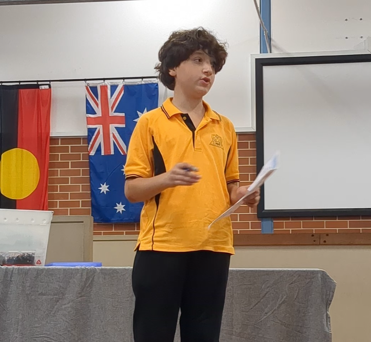 A student participating in a debate.
