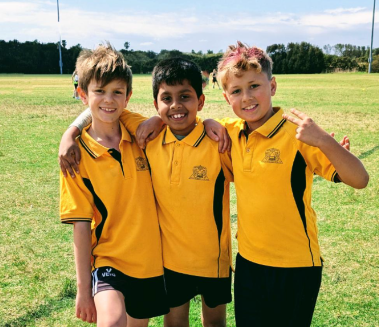 Boys hugging at a gala day