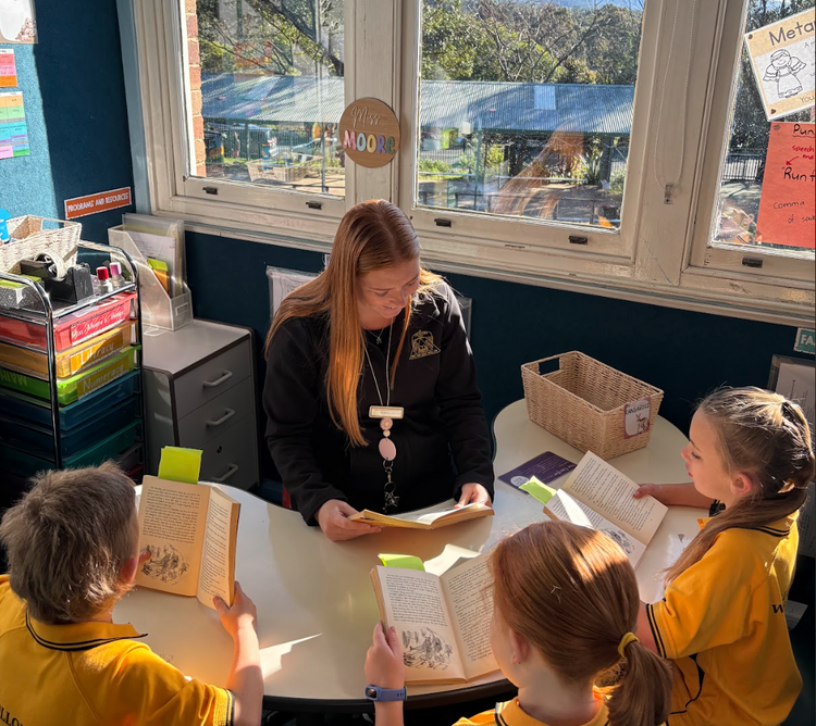 a teacher reading with children