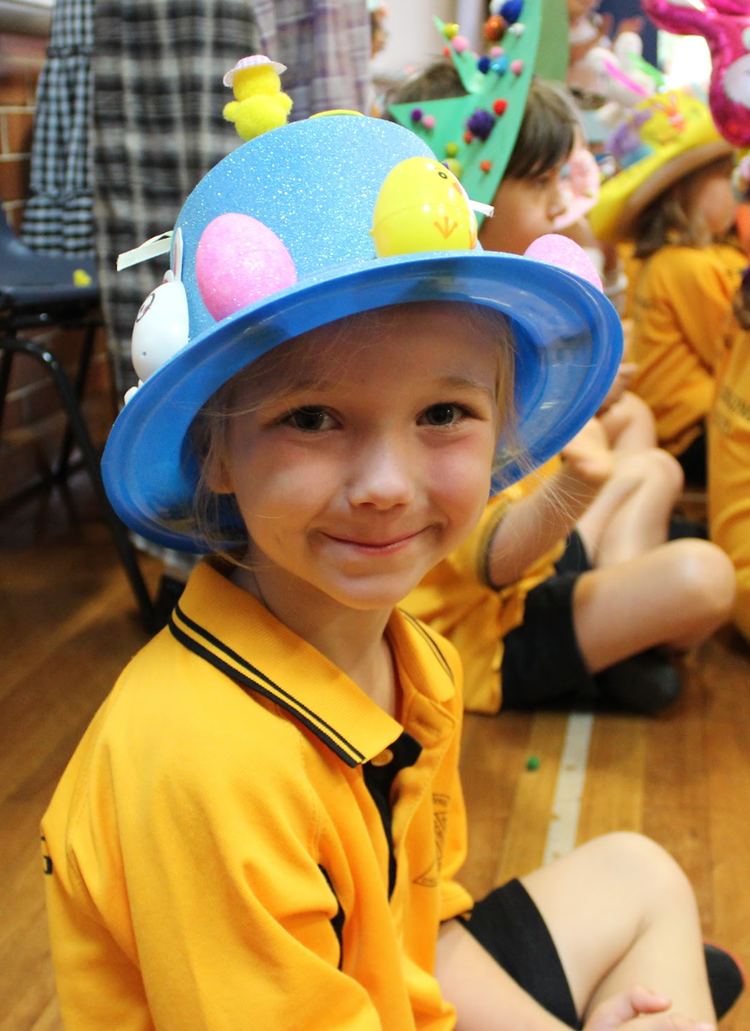 Child wearing an Easter Hat.