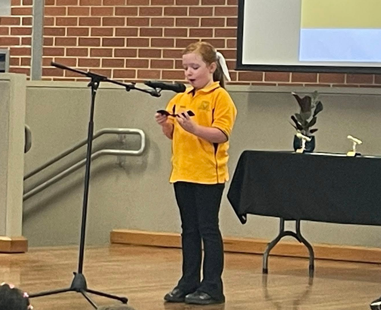 A student participating in a public speaking competition.