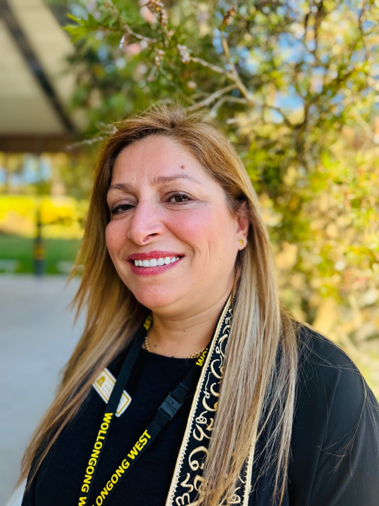 A staff member in cultural dress.