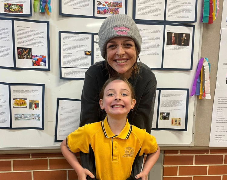 A high potential student sharing their learning with their mother.