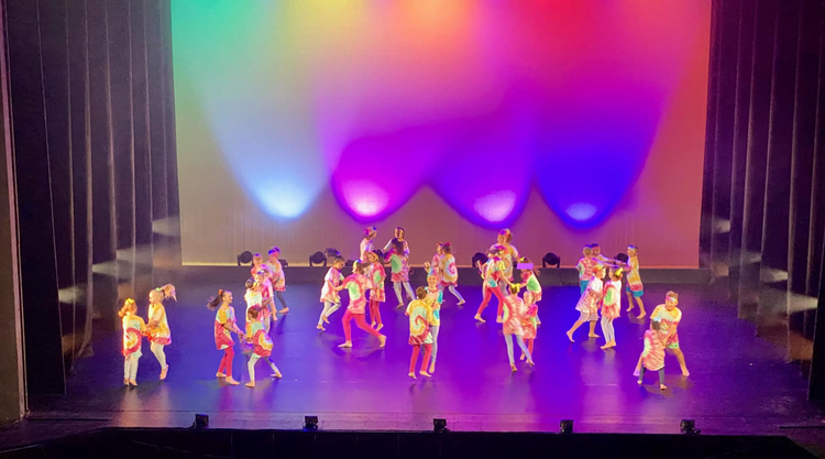 dance troupe performing on stage