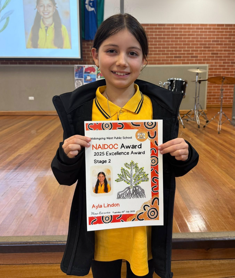 Girl holding an award