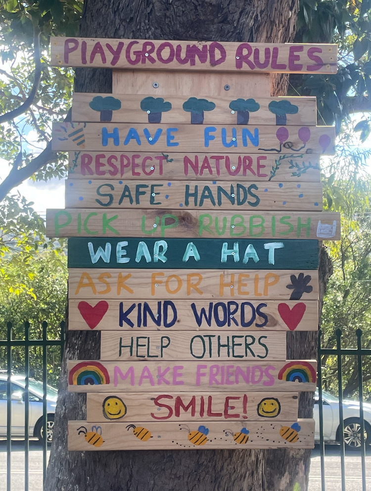 playground sign displaying rules