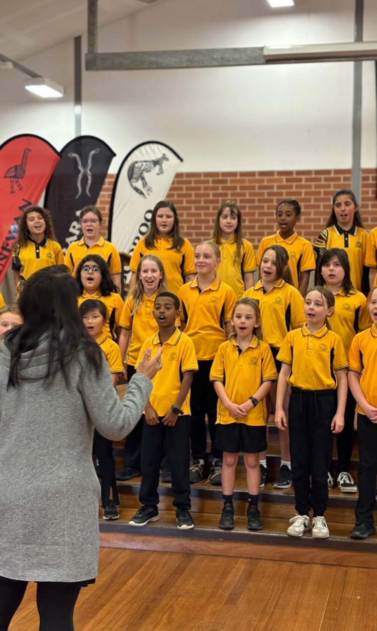 our school choir rehearsing