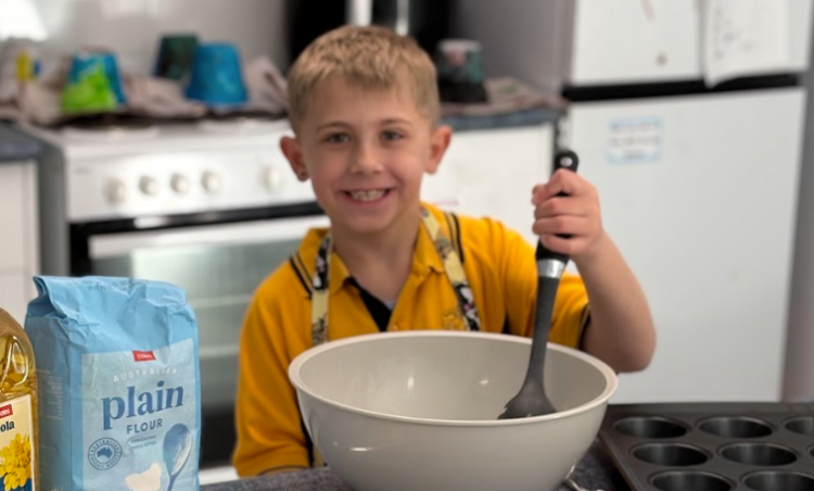 Child cooking in kitchen