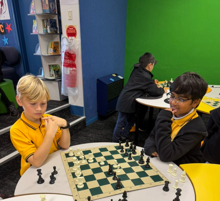 two boys playing chess