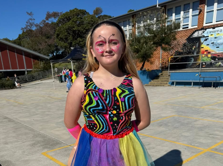 Girl in a costume before a performance
