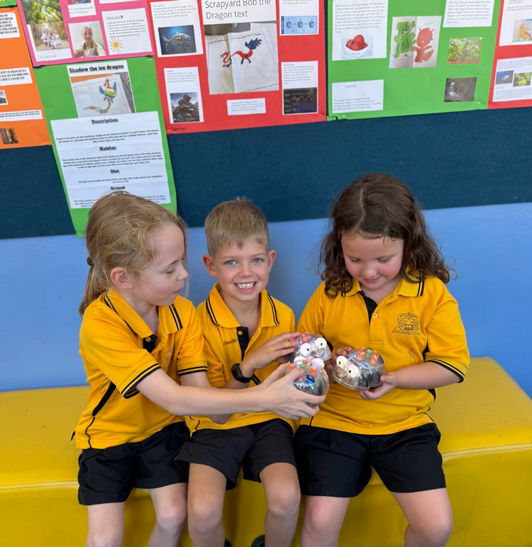 children holding robots