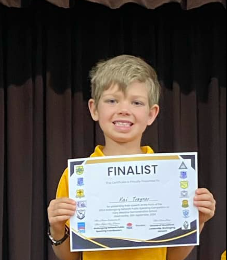 Boy holding a certififcate