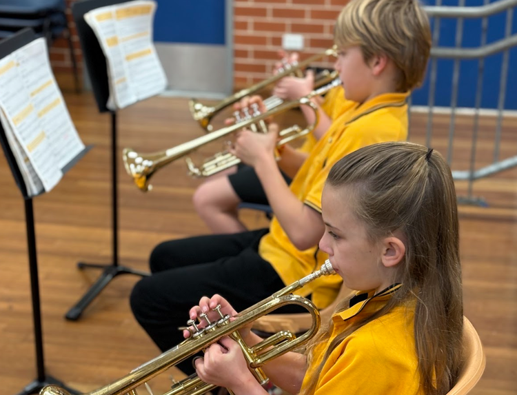 Band members playing trumpets